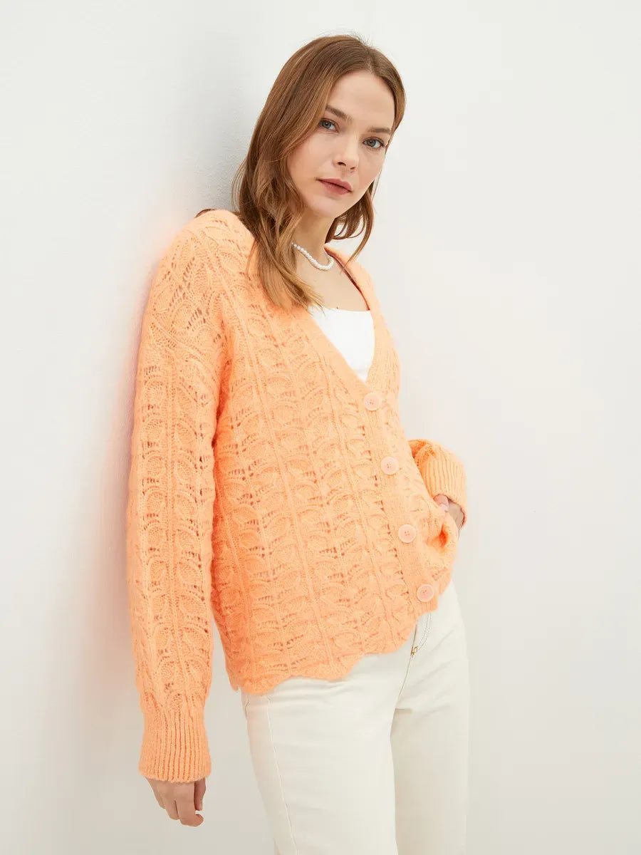 Elysia Cardigan by Lauven in vibrant coral, featuring a V-neckline and relaxed fit.