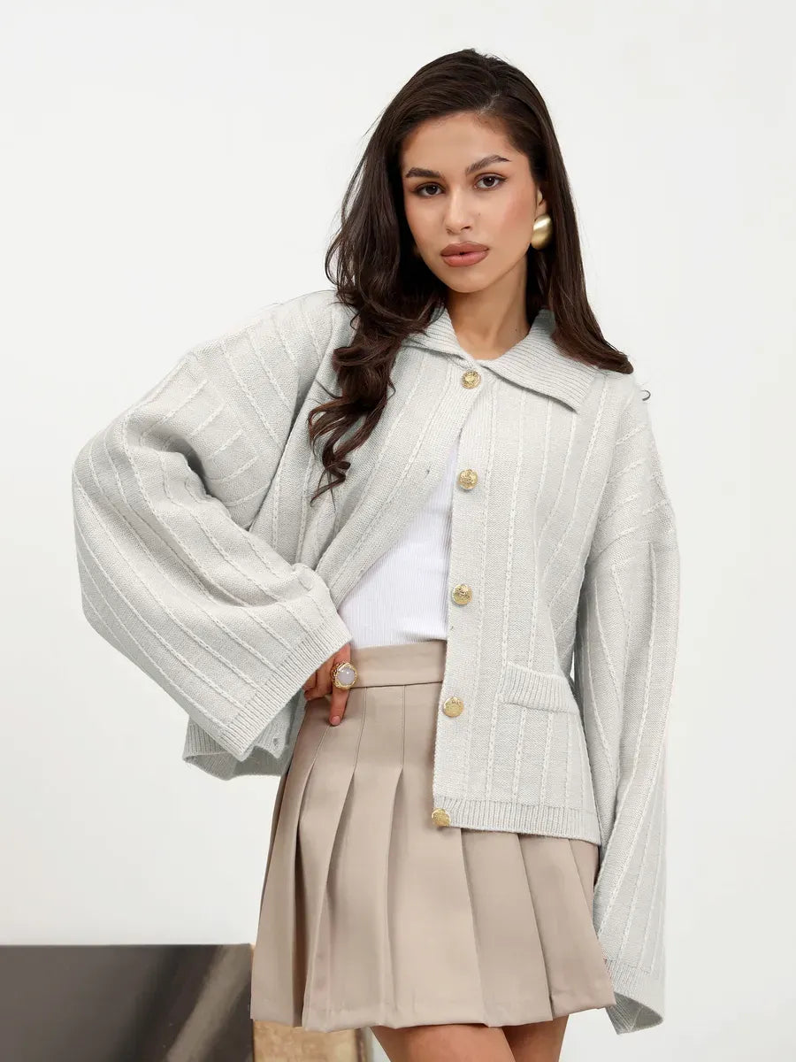 Glacier Cardigan by Lauven featuring chic light gray oversized knit with braided detail and wide bell sleeves.