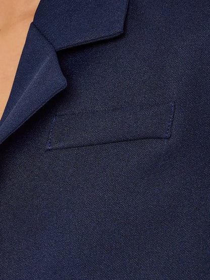 Marine Blazer by Lauven - close-up of the navy fabric and pocket on women's oversized cropped jacket.