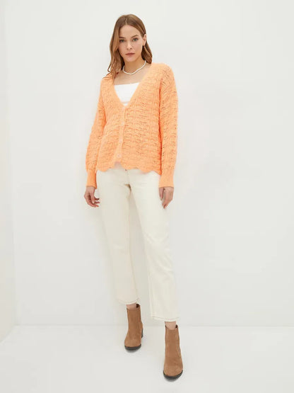 Elysia Cardigan by Lauven, soft jacquard knit in coral, featuring a relaxed fit and V-neckline.