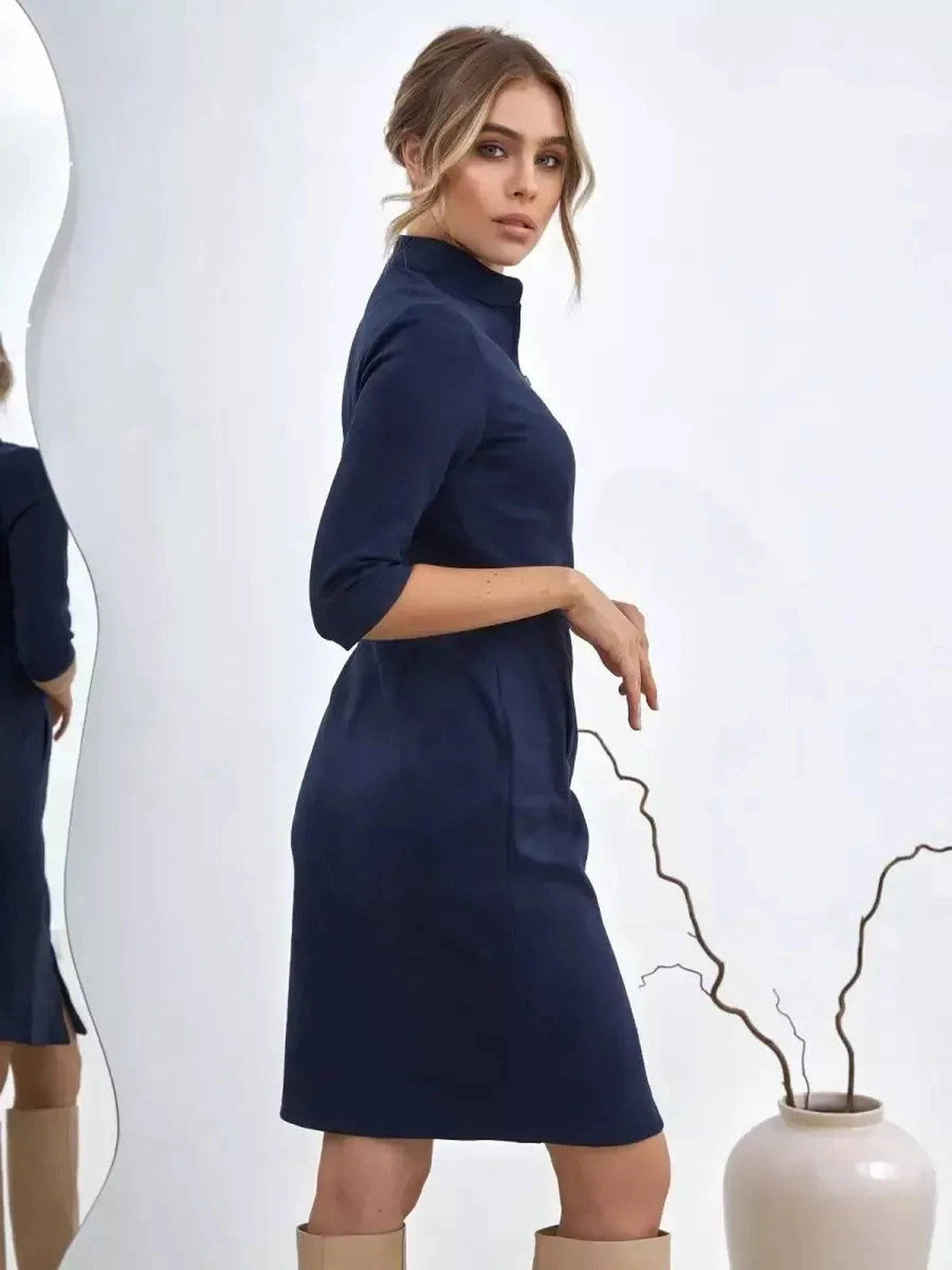 Orion Mini Dress by Lauven showcasing tailored zip-front elegance and structured silhouette in navy.