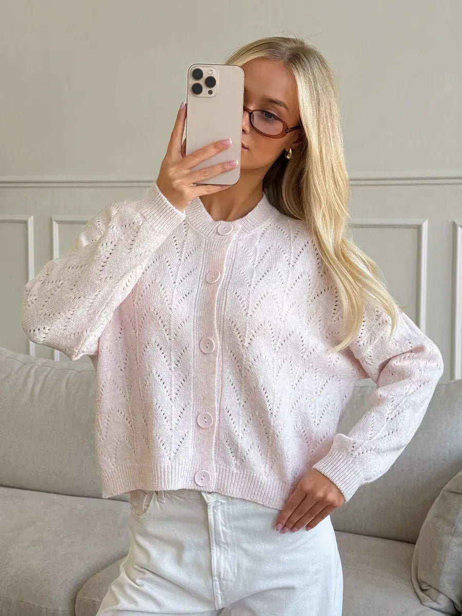 Blush Cardigan by Lauven, a soft pink knit button-up with delicate openwork lace design.