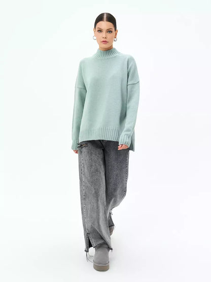 Celeste Sweater in mint green worn by model, oversized wool blend knit from Lauven for modern elegance.