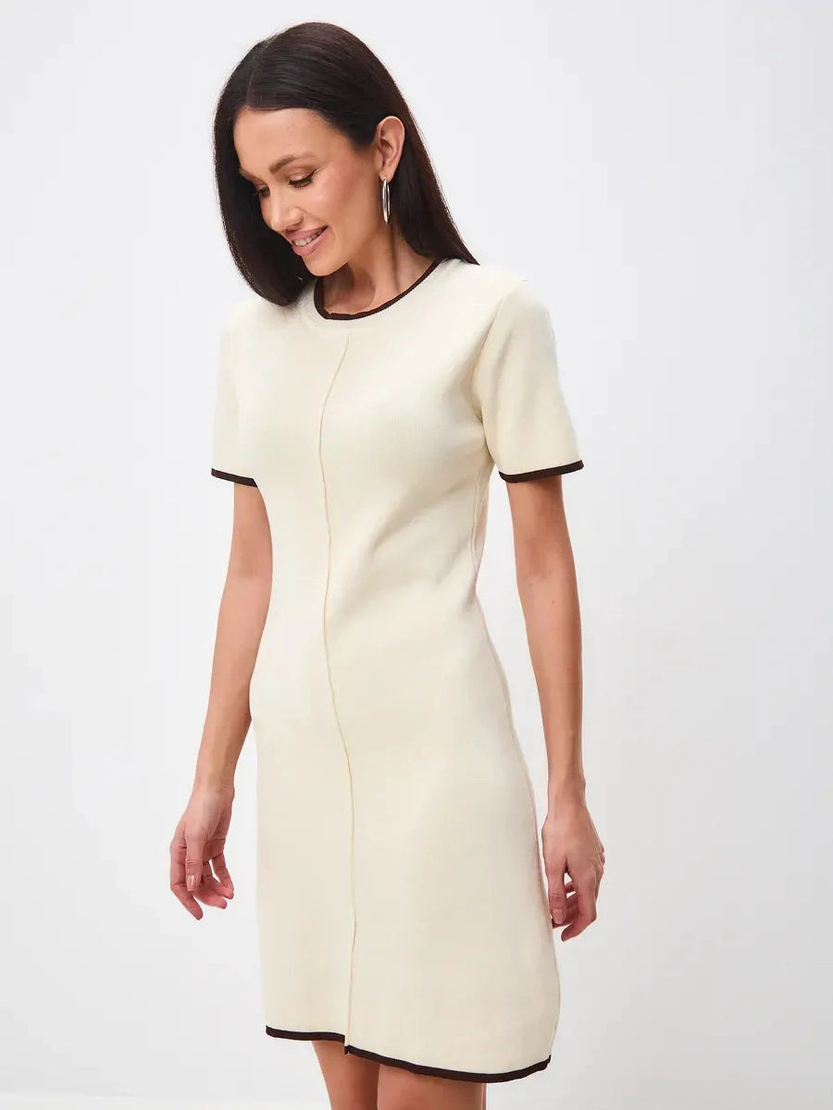 Marbella Mini Dress by Lauven in soft neutral tones, featuring a refined A-line silhouette and modern contrast trim.