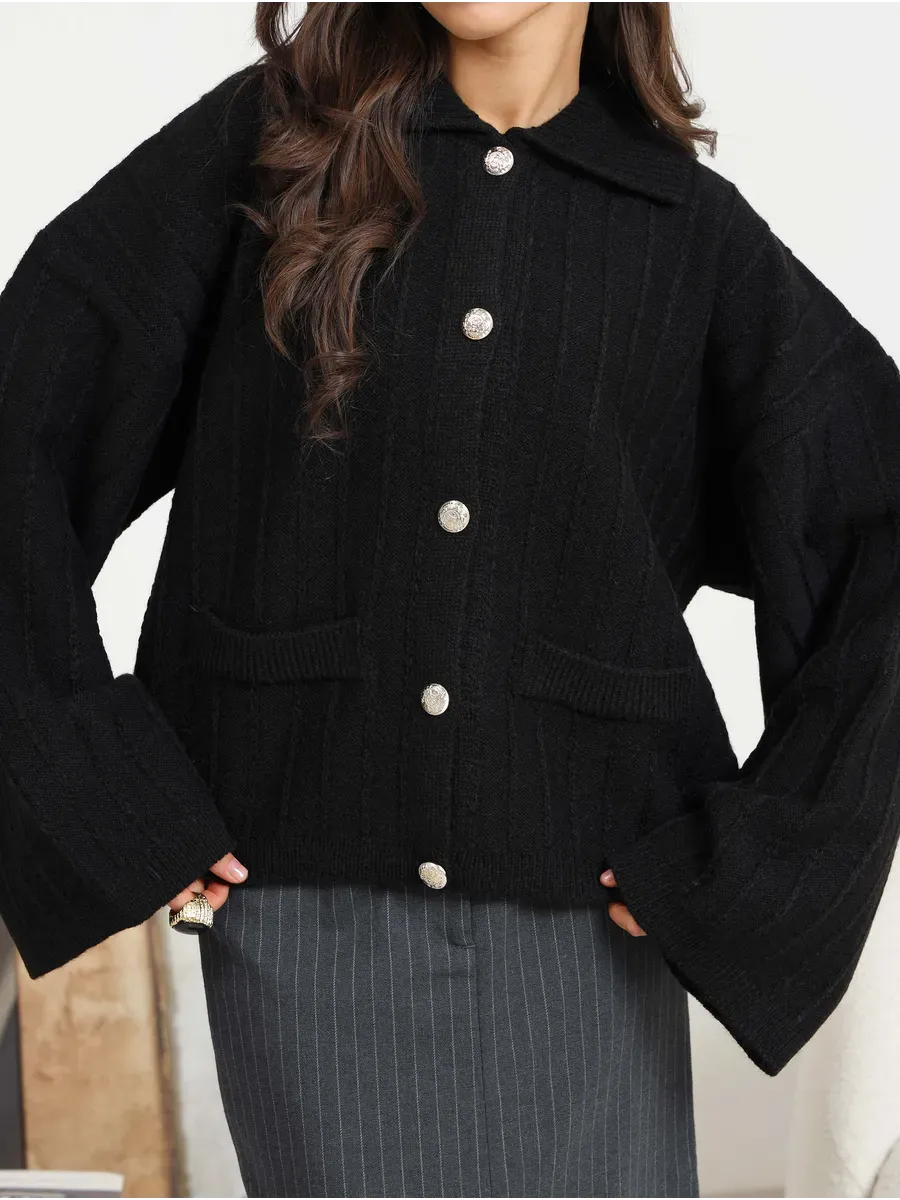 Onyx Cardigan by Lauven - Oversized black knitwear with braided design and wide sleeves, perfect for spring layering.