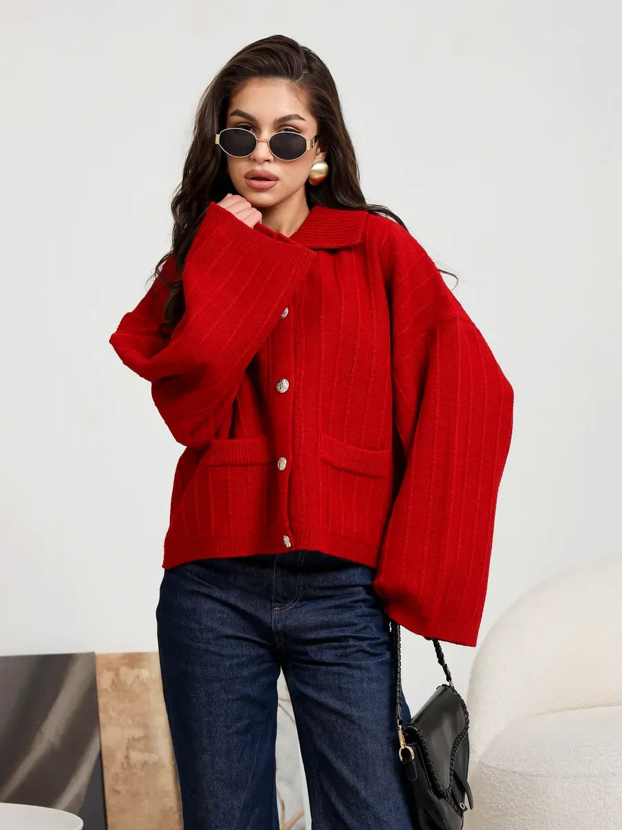 Crimson Cardigan by Lauven — Oversized red knitwear with button detail and wide sleeves, perfect for layering.
