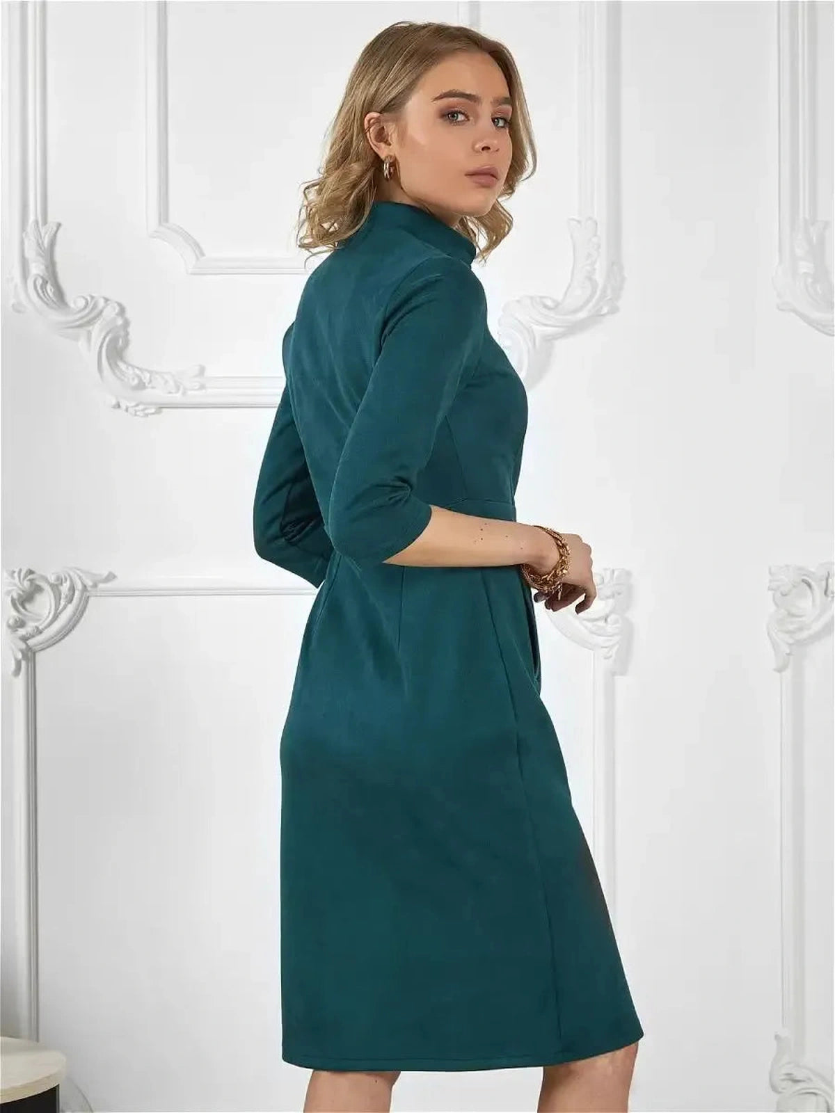 Avalon Mini Dress by Lauven, showcasing a sleek zip-front silhouette and modern structured elegance.