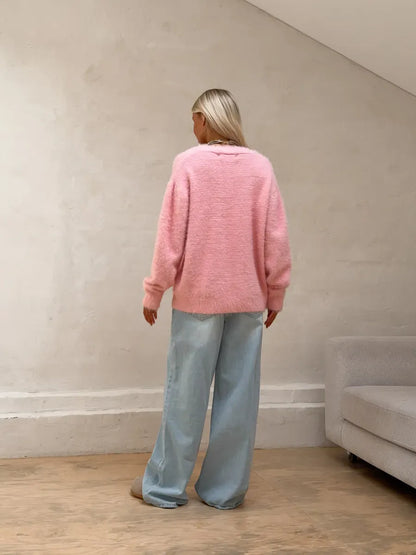 Flora Cardigan by Lauven, oversized pink fluffy knit with button closure, perfect for a cozy and stylish look.