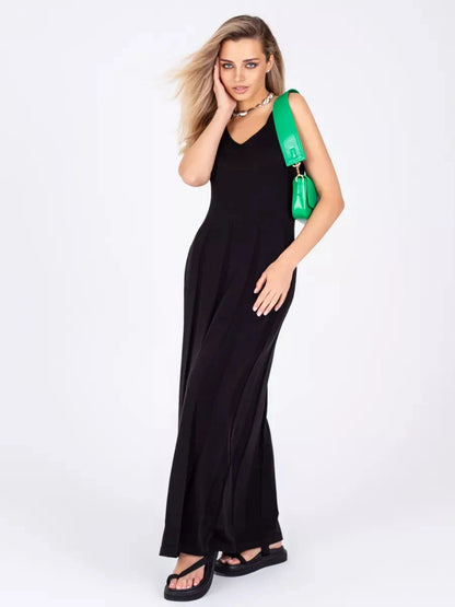 Model wearing the Noiré Maxi Dress by Lauven, showcasing its elegant A-line silhouette and minimalist style.
