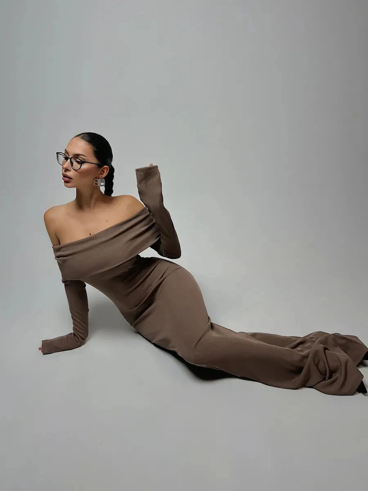 Solara Maxi Dress by Lauven in rich chocolate hue with off-shoulder design and floor-length silhouette.