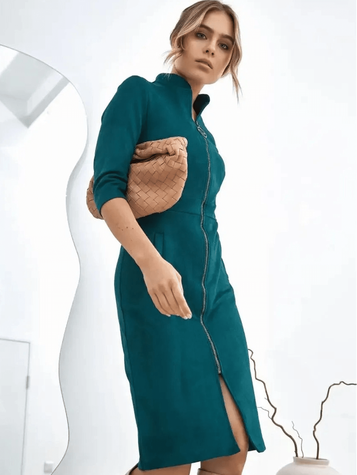 Avalon Mini Dress by Lauven, sleek zip-front silhouette in teal, showcasing modern structured elegance and versatile styling.