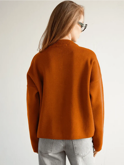Tangelo Cardigan by Lauven in warm orange color, showcasing a chic cropped silhouette from the back.