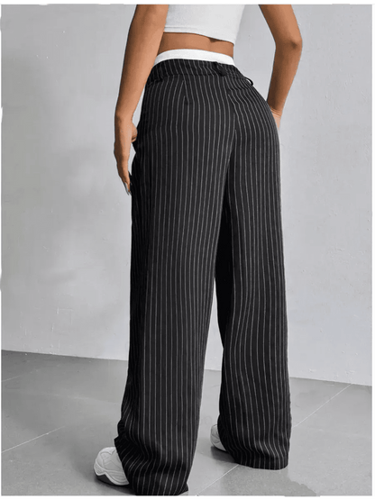 Orion Pinstripe Pants by Lauven, showcasing a high-waist wide-leg silhouette from the back.