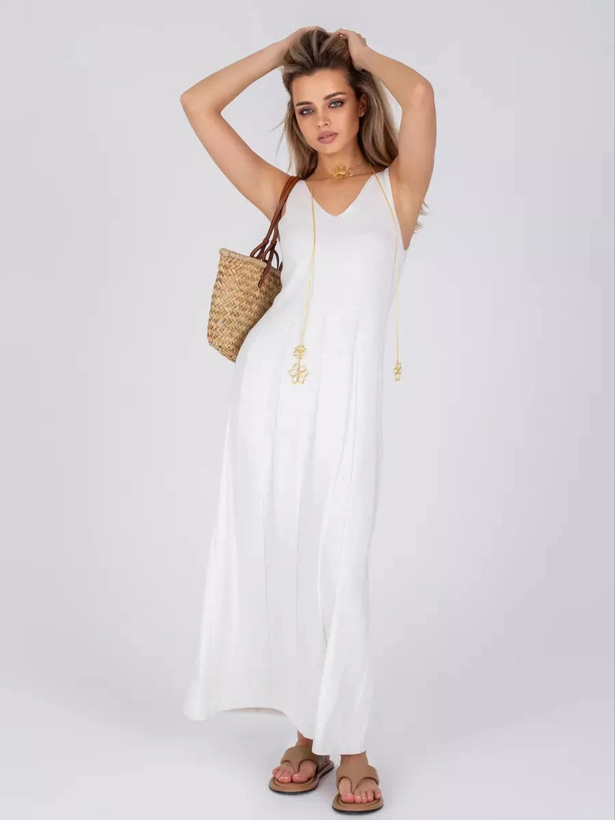 Isola Maxi Dress by Lauven, a timeless white knit summer dress featuring an airy A-line silhouette.