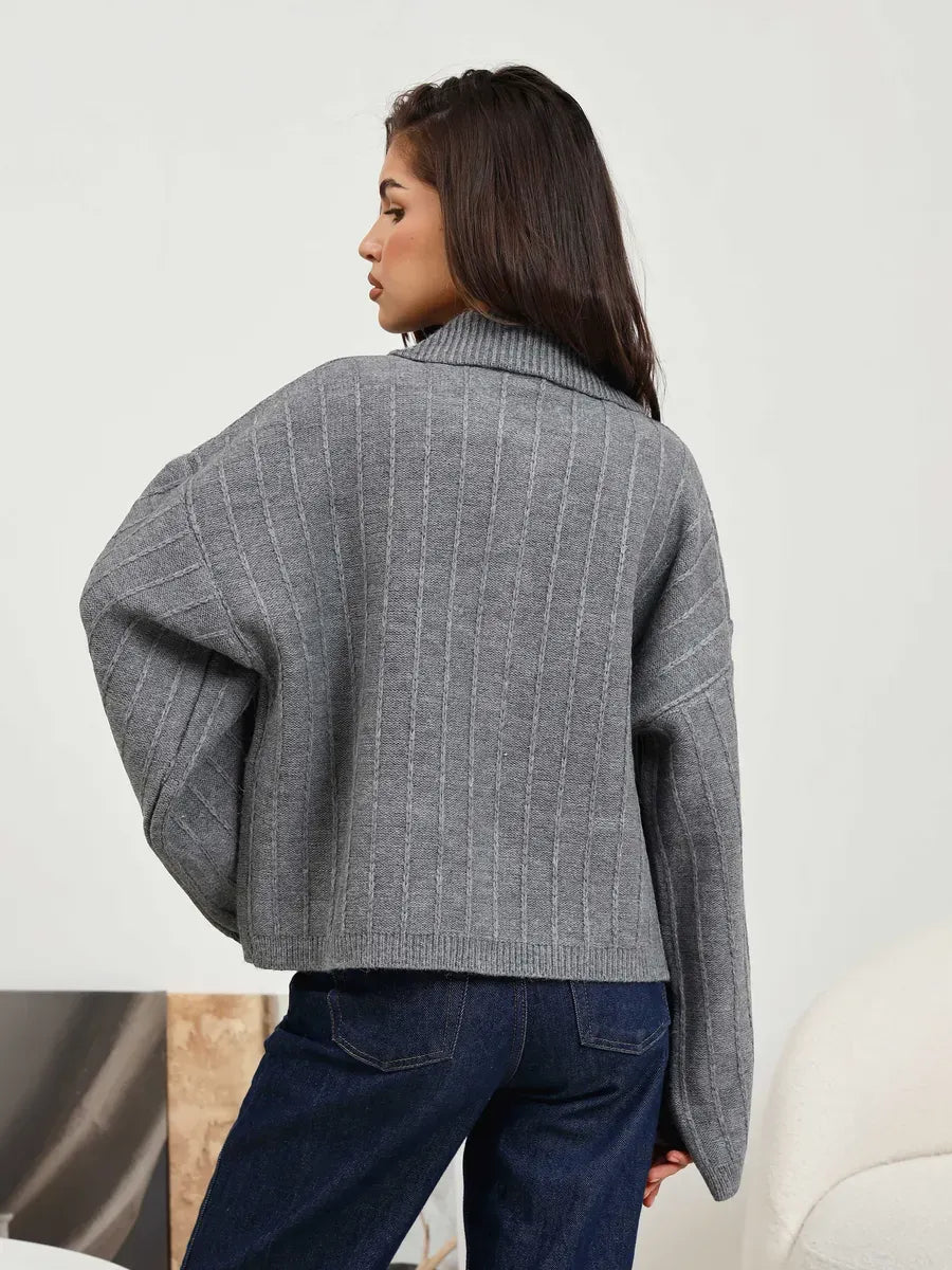 Slate Cardigan from Lauven, a chic dark gray oversized knitwear with a cozy braided detail.
