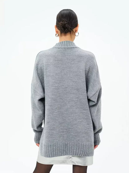 Lauven Luna Sweater featuring an oversized long knit design and ribbed turtleneck in dark gray.