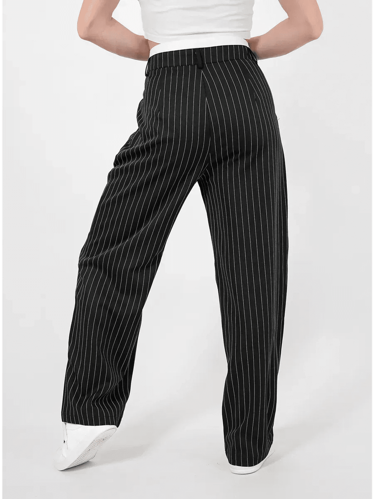 Orion Pinstripe Pants by Lauven showcasing wide-leg silhouette and elegant pinstripes from the back view.