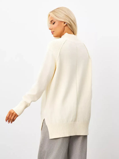Liora Sweater by Lauven, oversized milk white cashmere knitwear with high neck, back view showing elegant design.