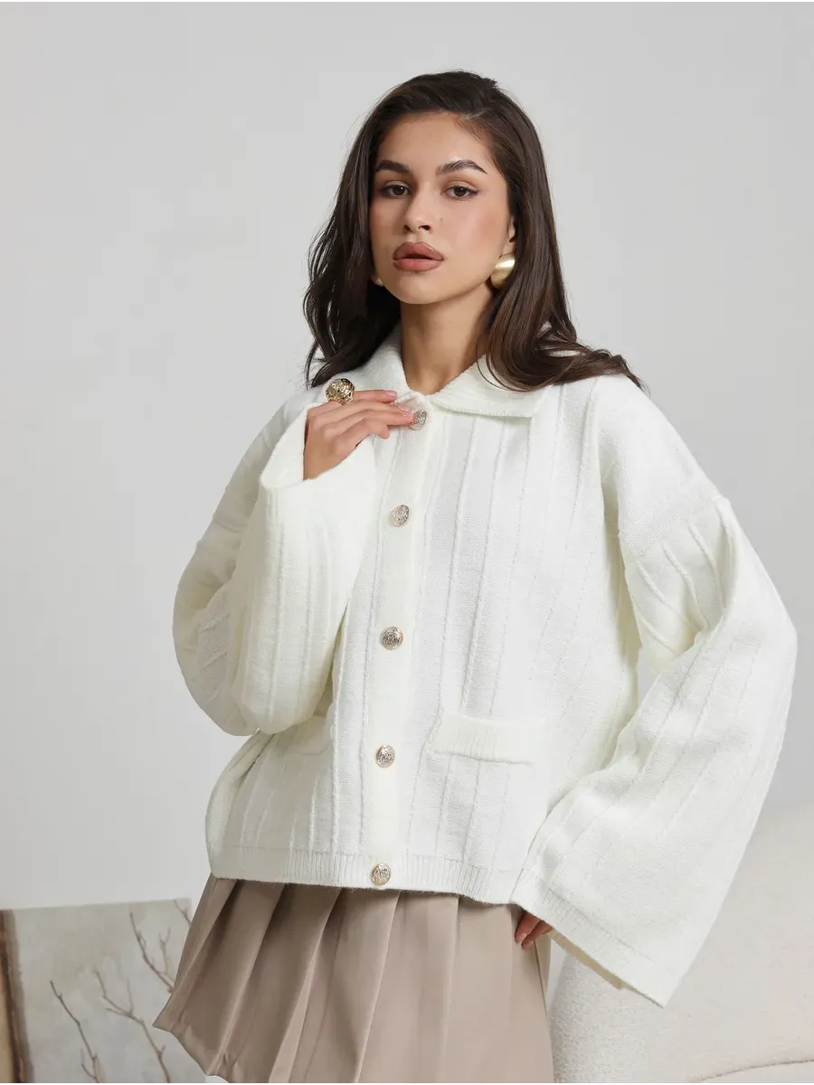 Eira Cardigan by Lauven, stylish white oversized knitwear with braided pattern and bell sleeves.