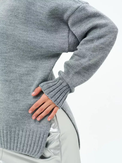 Luna Sweater by Lauven featuring oversized knit design with ribbed turtleneck in dark gray.