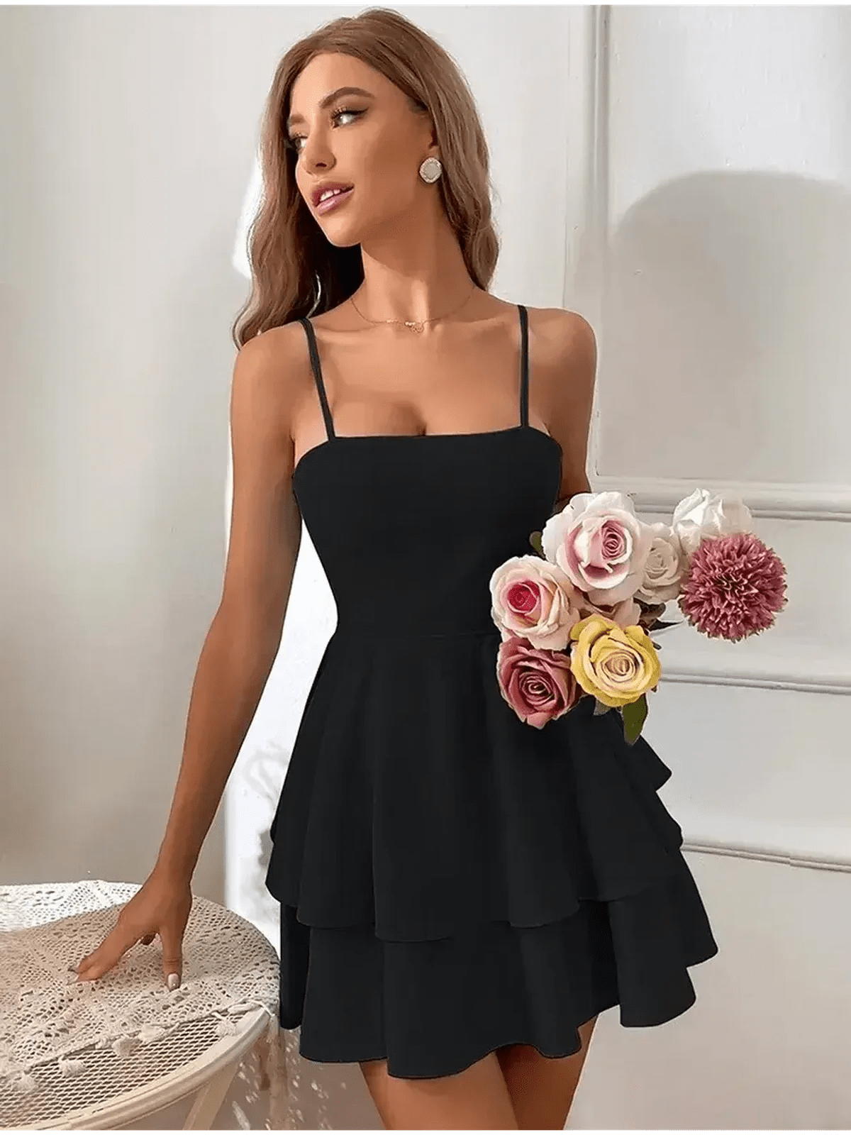 Noir Bloom Mini Dress in black, featuring a square neckline, adjustable straps, and a flirty tiered skirt.