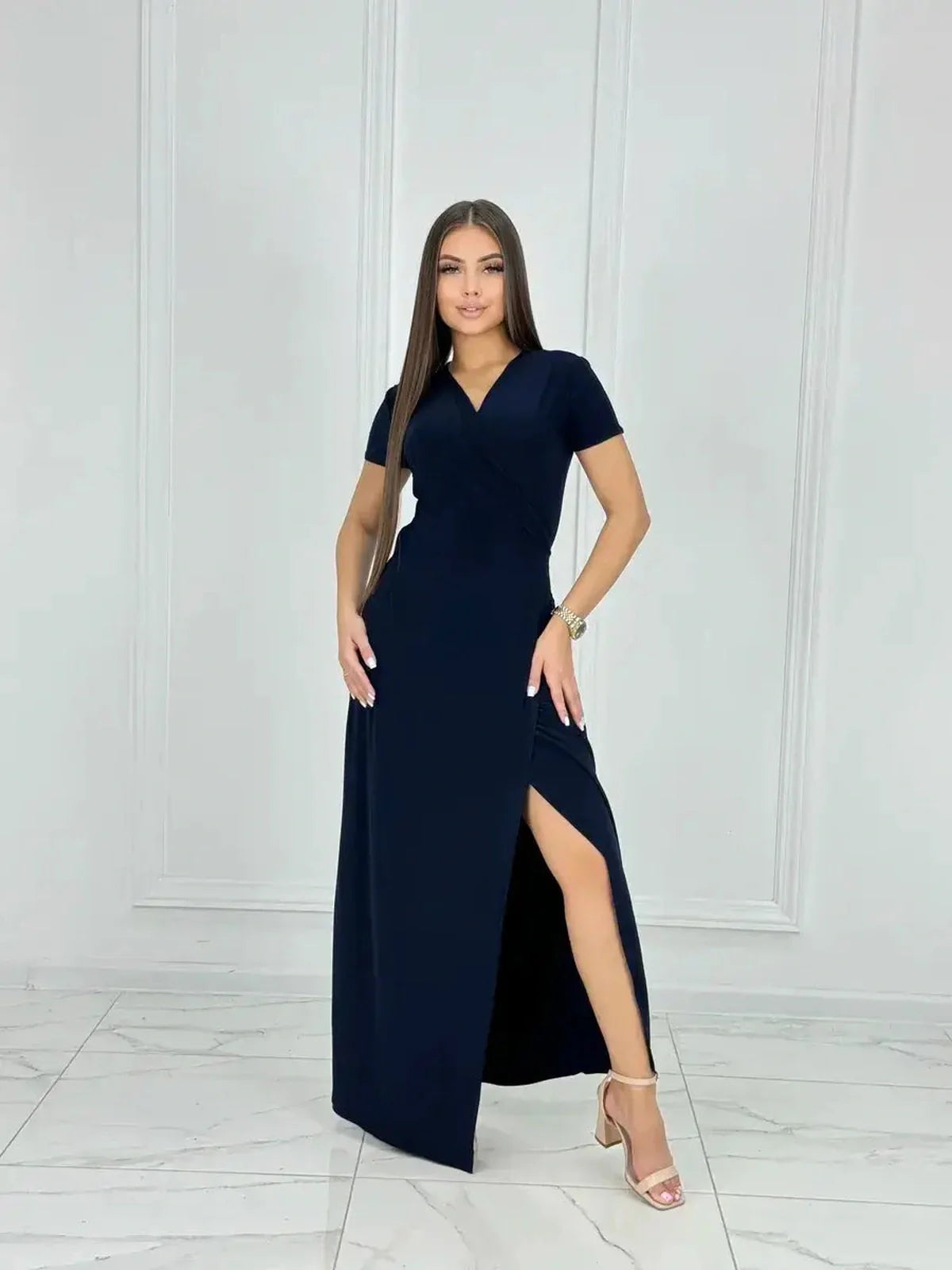 Eclipse Maxi Dress featuring a sleek wrap bodice and thigh-high slit, perfect for summer events and cocktail parties.