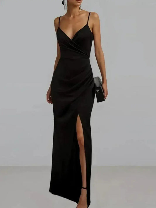 Elegantly styled black maxi dress with V-neckline and side slit, perfect for evening wear and formal occasions.