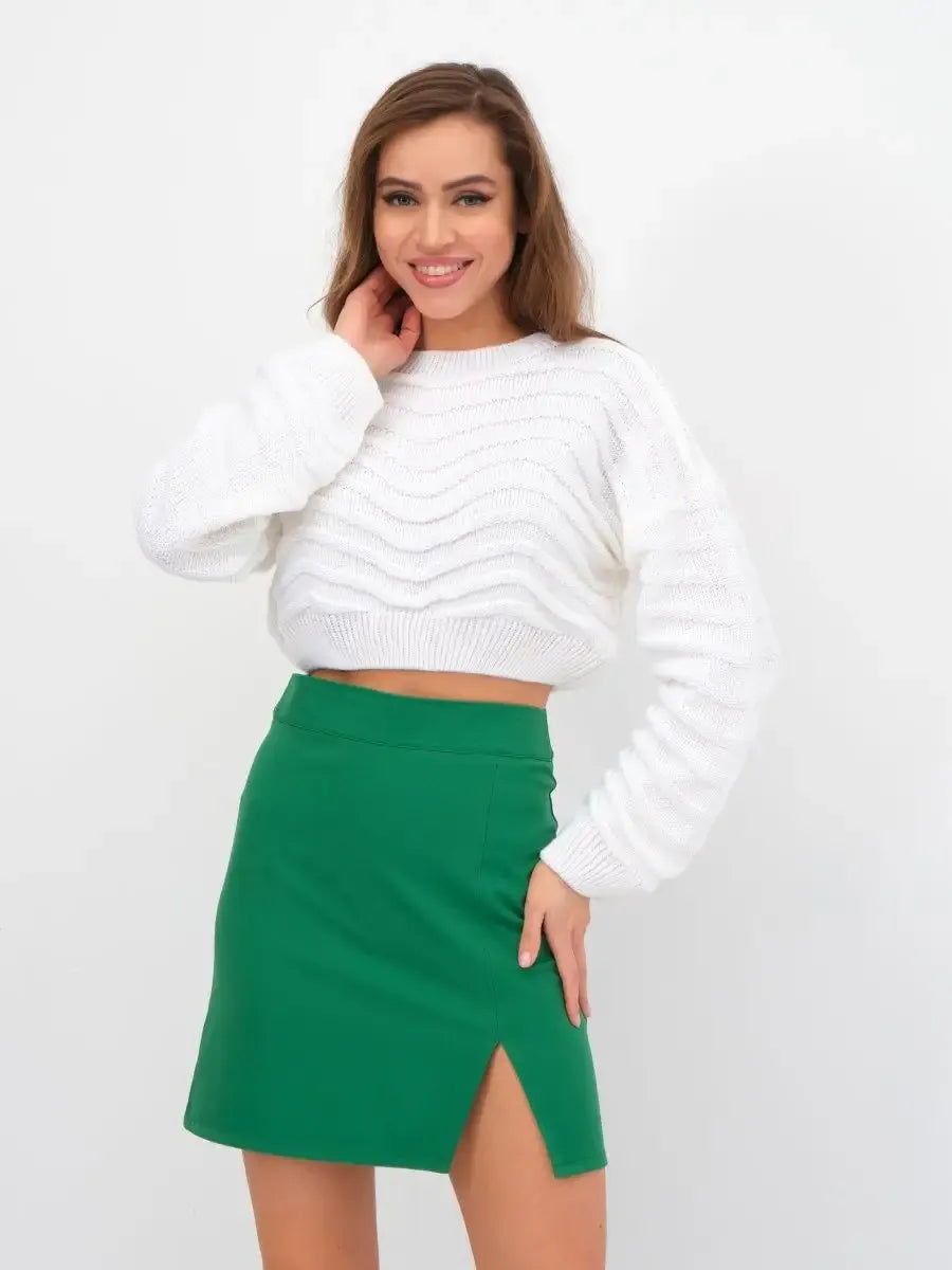 Lyra Sweater by Lauven—White Cropped Knit with Relaxed Silhouette, styled with a green skirt.