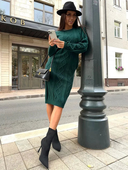 Selene Midi Dress by Lauven – Elegant emerald knit dress worn by a woman, showcasing style and comfort.