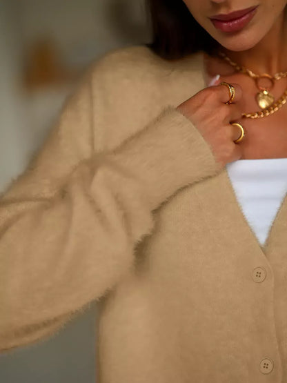 Camelia Cardigan by Lauven, plush oversized knitwear with button closure, showcasing a beige tone for stylish comfort.