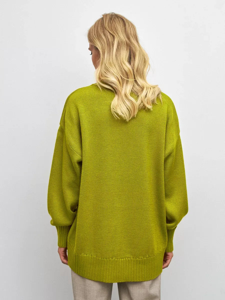 Vesper Sweater by Lauven in vibrant pistachio, showcasing an oversized fit and cozy texture from the back.