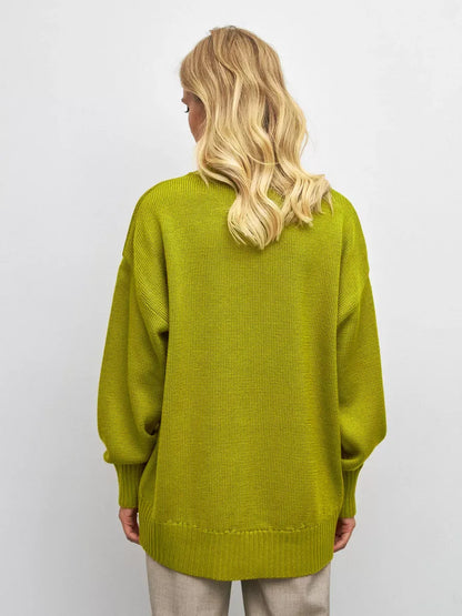 Vesper Sweater by Lauven in vibrant pistachio, showcasing an oversized fit and cozy texture from the back.