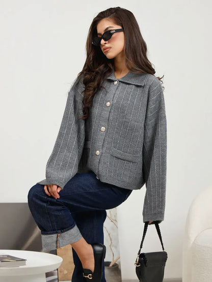 Slate Cardigan by Lauven: Elegant dark gray oversized knitwear with braided detail, perfect for trendy spring layering.