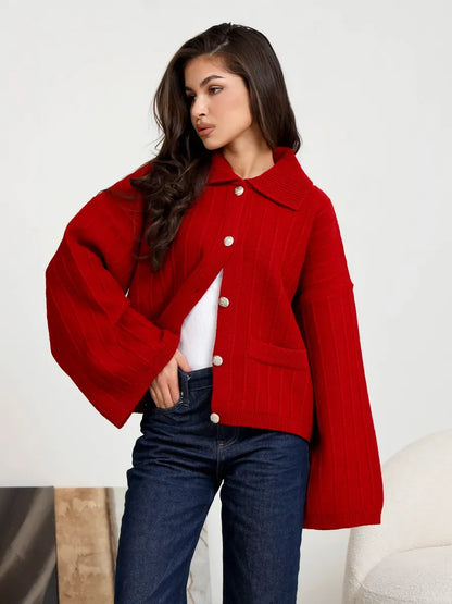 Crimson Cardigan by Lauven – Bold red oversized knitwear with braided pattern and bell sleeves.