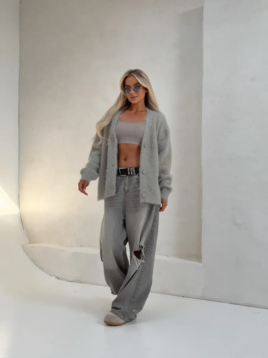 Eira Cardigan by Lauven: Oversized light gray fluffy knit worn with casual outfit, showcasing contemporary style.