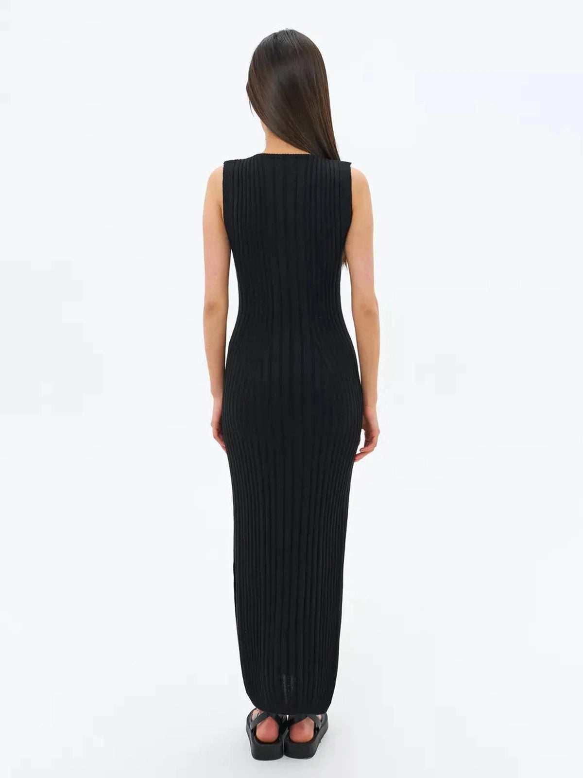 Noir Midi Dress by Lauven, showcasing a sleek back view of the black ribbed knit design.