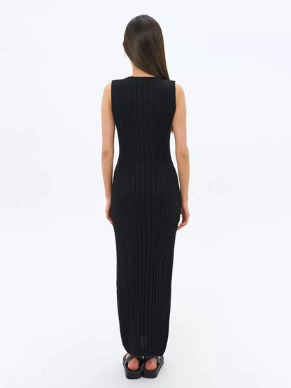Noir Midi Dress by Lauven, showcasing a sleek back view of the black ribbed knit design.