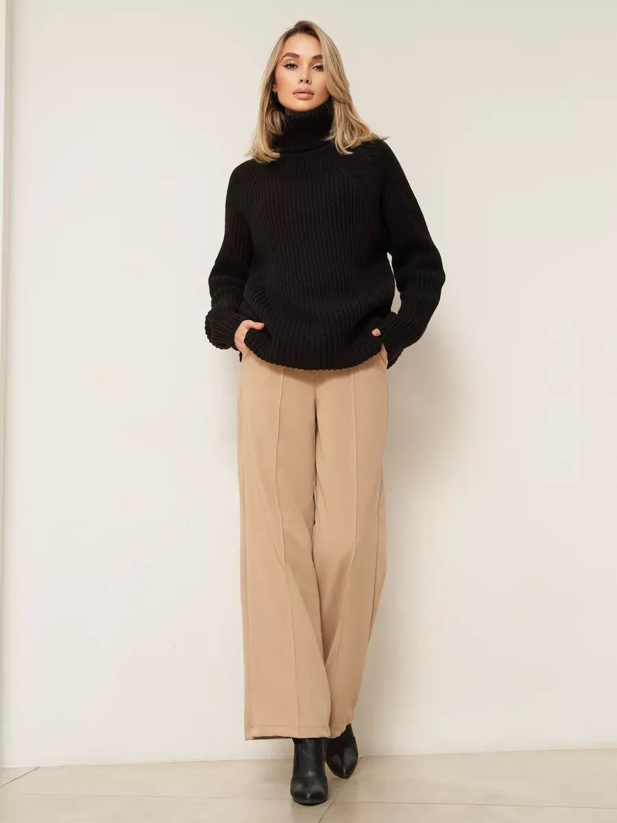 Onyx Sweater by Lauven - Oversized black knitwear with turtleneck, perfect for winter styling.