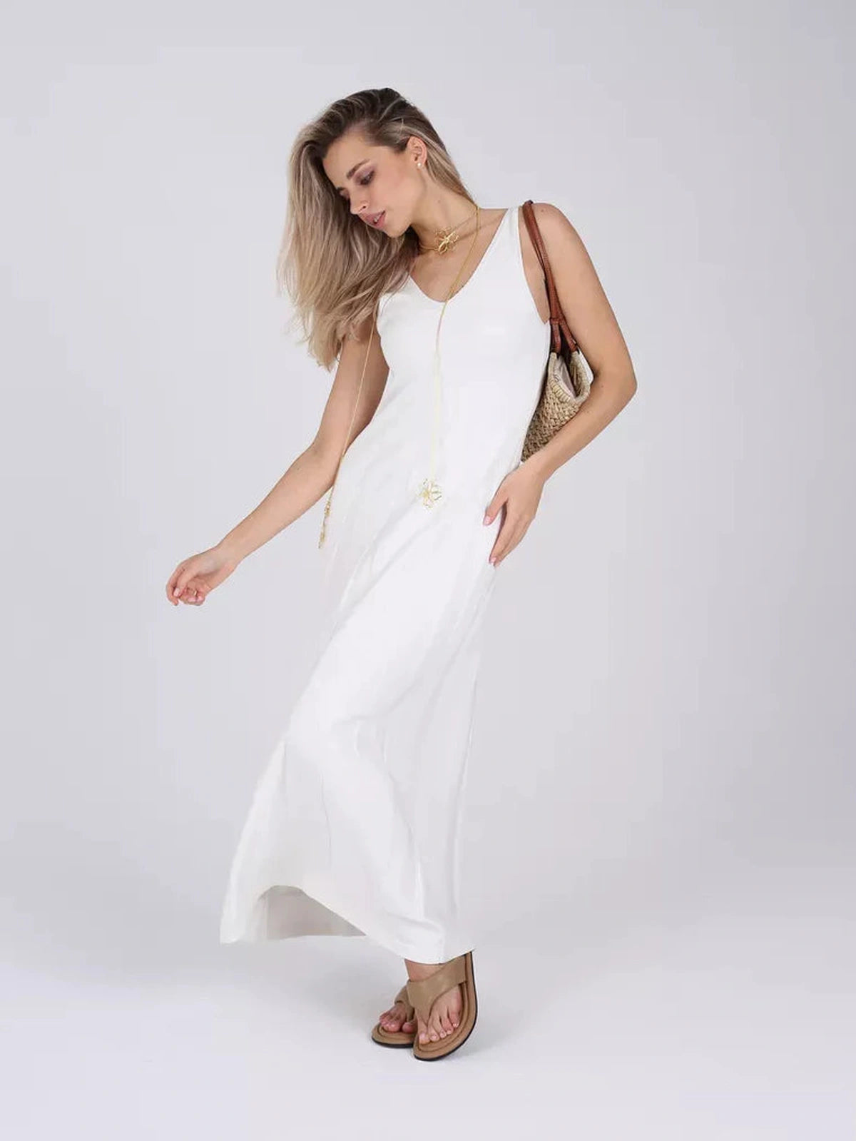 Isola Maxi Dress by Lauven: Timeless white knit summer dress with airy A-line silhouette.