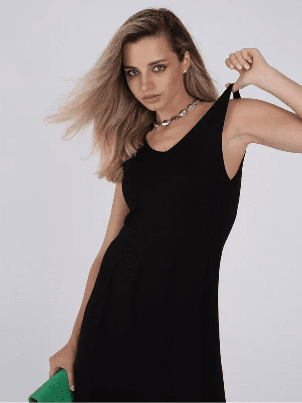 Noiré Maxi Dress by Lauven, a chic black knit dress with an elegant A-line silhouette.