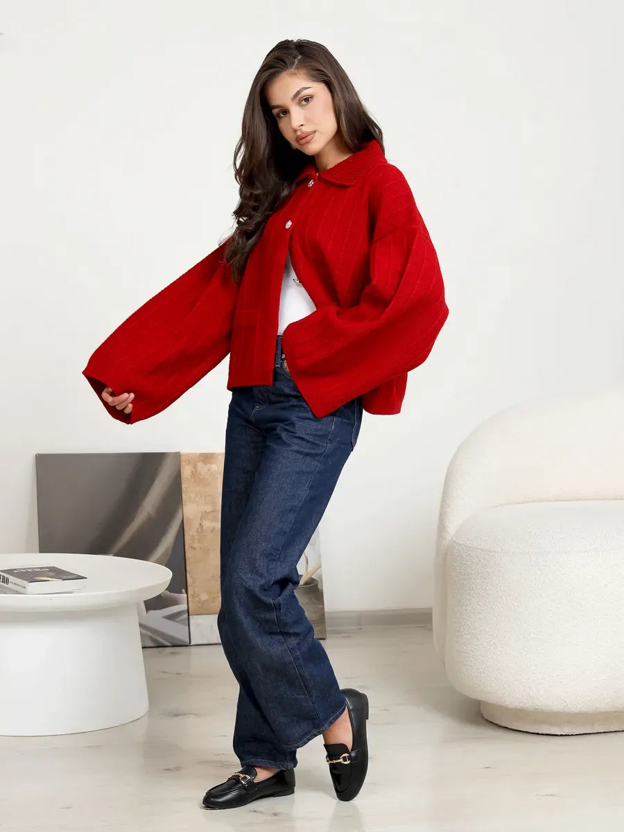 Crimson Cardigan by Lauven, bold red oversized knitwear with wide bell sleeves and braided pattern.