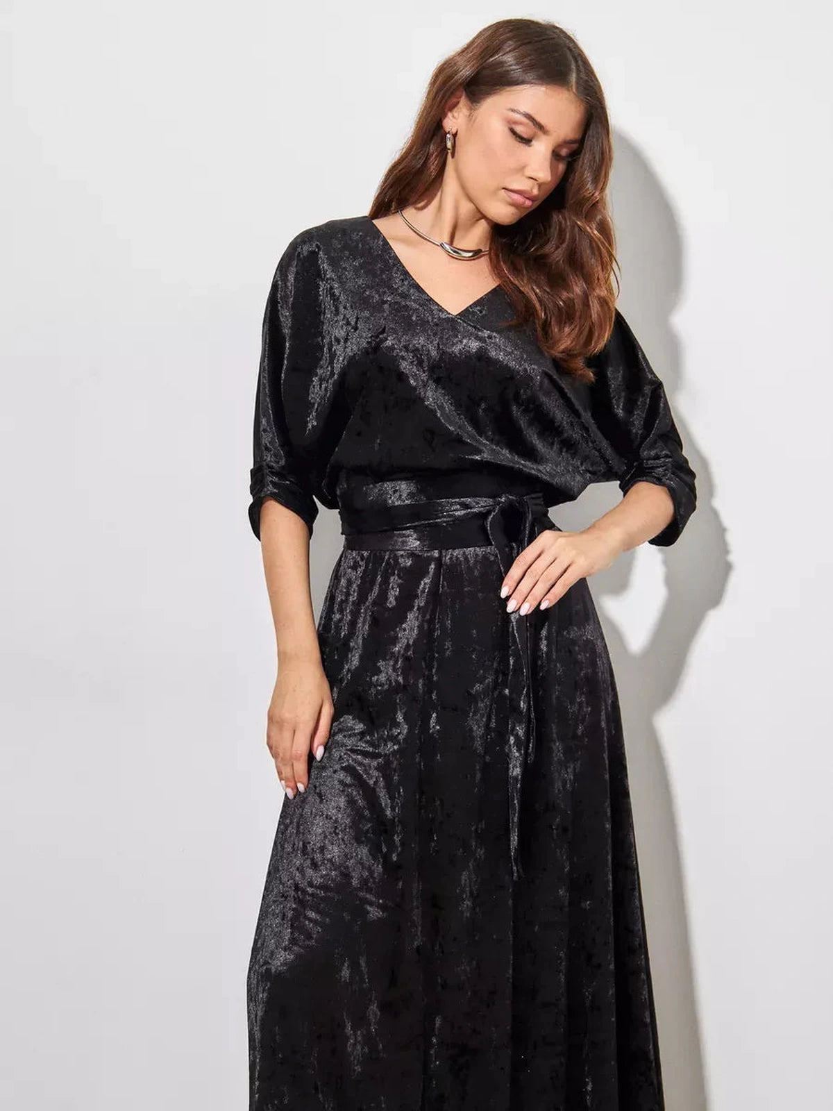 Aveline Maxi Dress by Lauven, featuring a black velvet V-neck gown with three-quarter sleeves and an A-line silhouette.