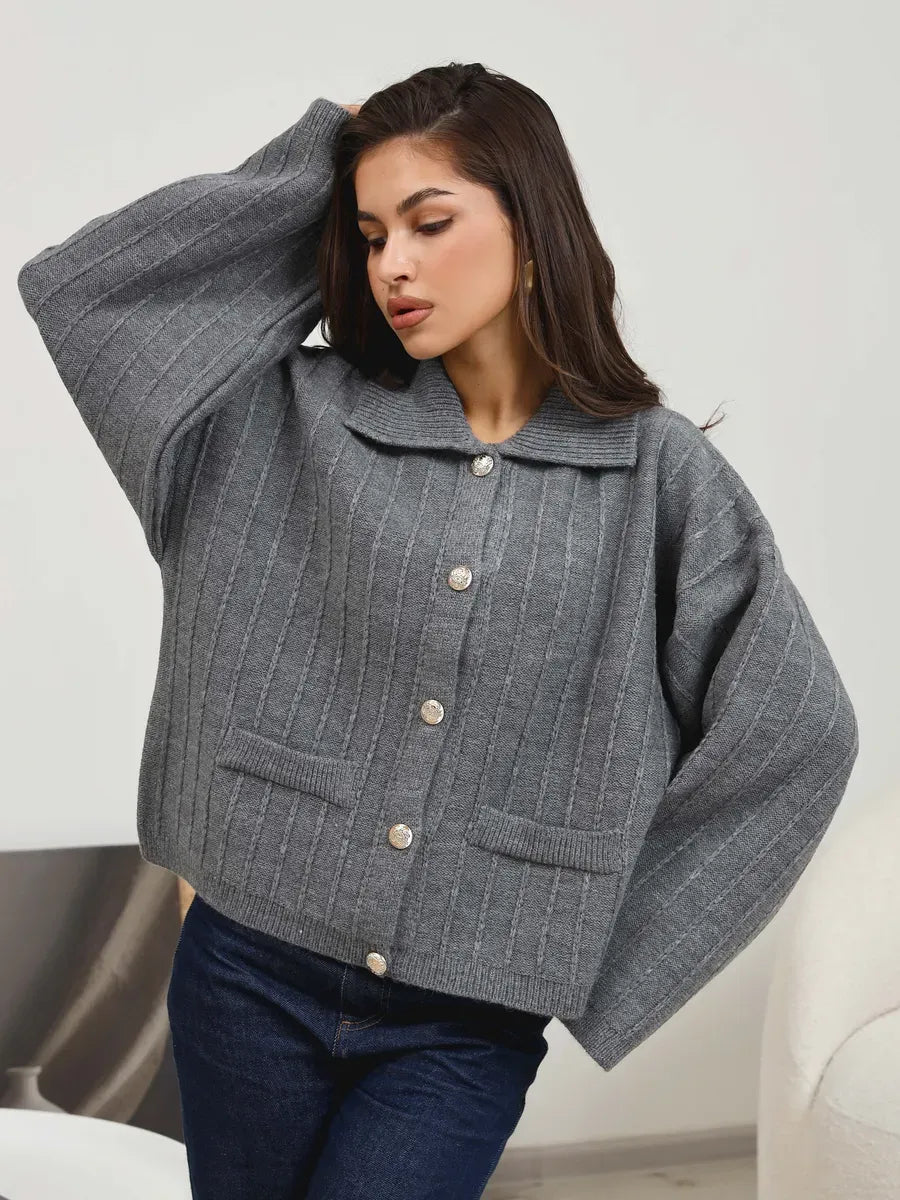 Slate Cardigan by Lauven — Stylish dark gray oversized knitwear with braided details, perfect for spring layering.