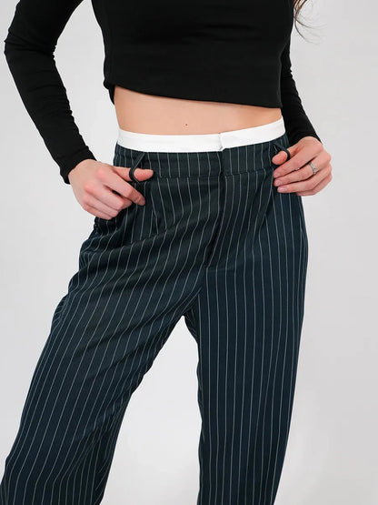 Siri Pants by Lauven, featuring high-waist wide-leg design and pinstripe pattern in deep green.