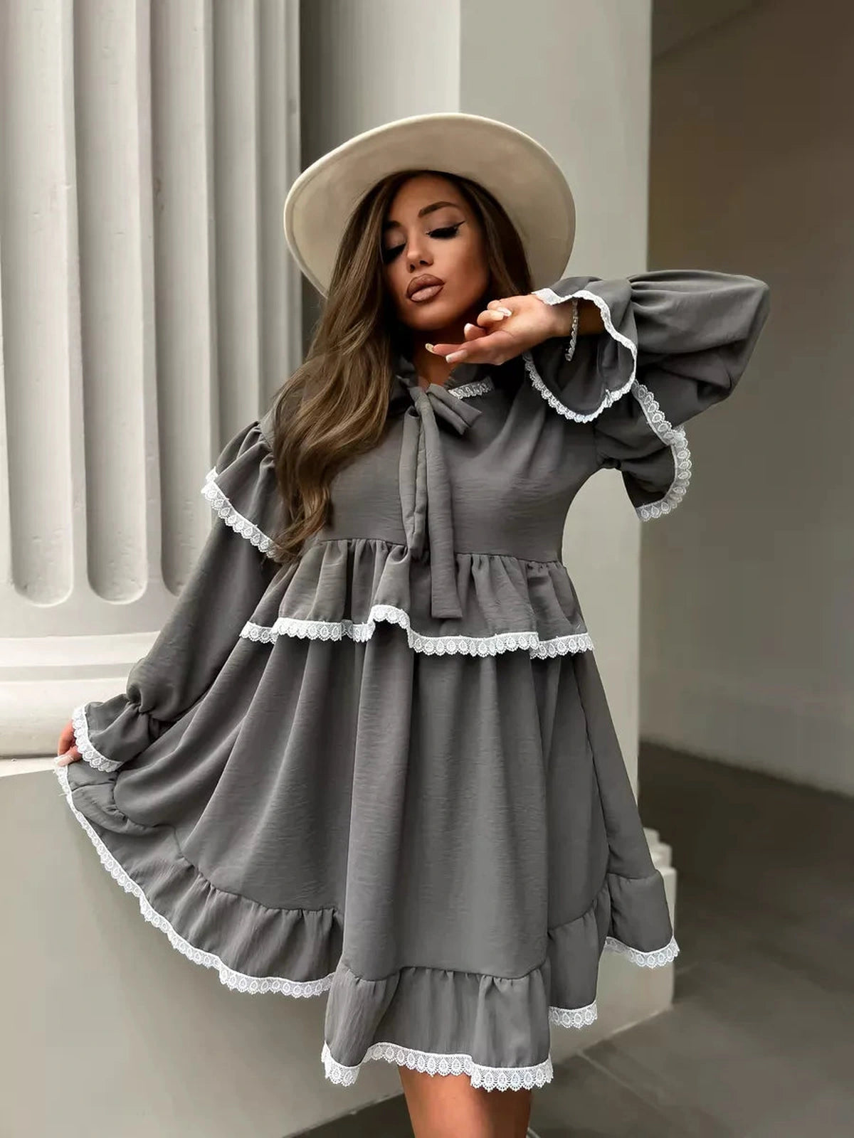 Lauven Luna Mini Dress in grey with elegant ruffled design and lace trim, perfect for special occasions.