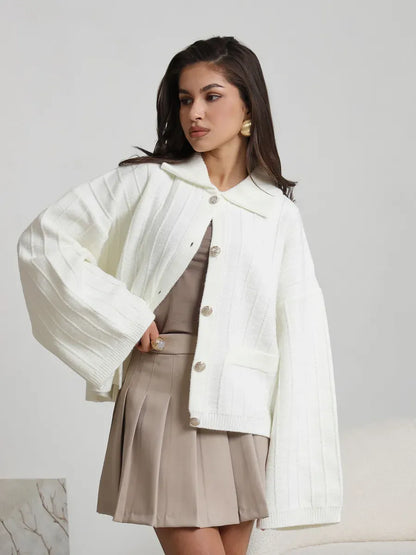 Eira Cardigan by Lauven - Stylish white oversized knitwear with braided pattern and wide bell sleeves.