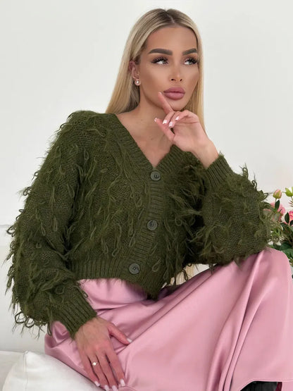 Olive Cardigan by Lauven featuring a cropped oversized khaki bouclé knit with feathered fringe.