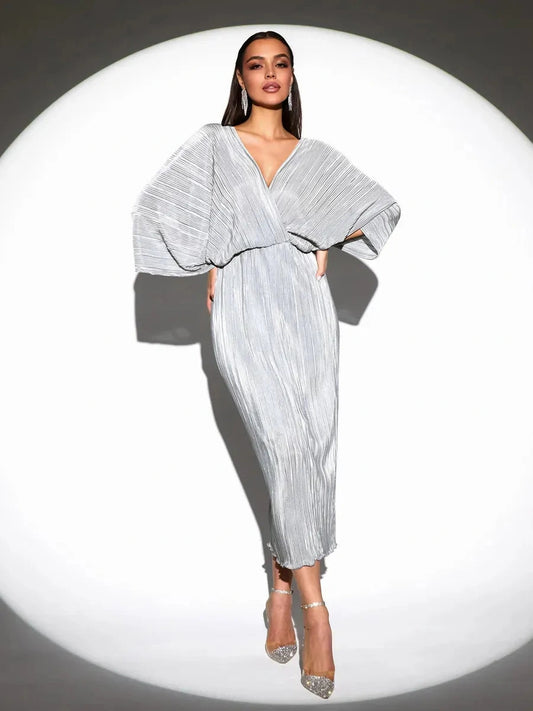 Lunara Midi Dress by Lauven, a stunning silver pleated dress with a graceful flow and lightweight texture.