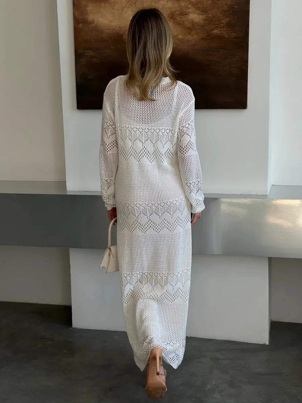 Aurelia Maxi Dress by Lauven, showcasing airy crochet elegance in a modern design for summer styling.