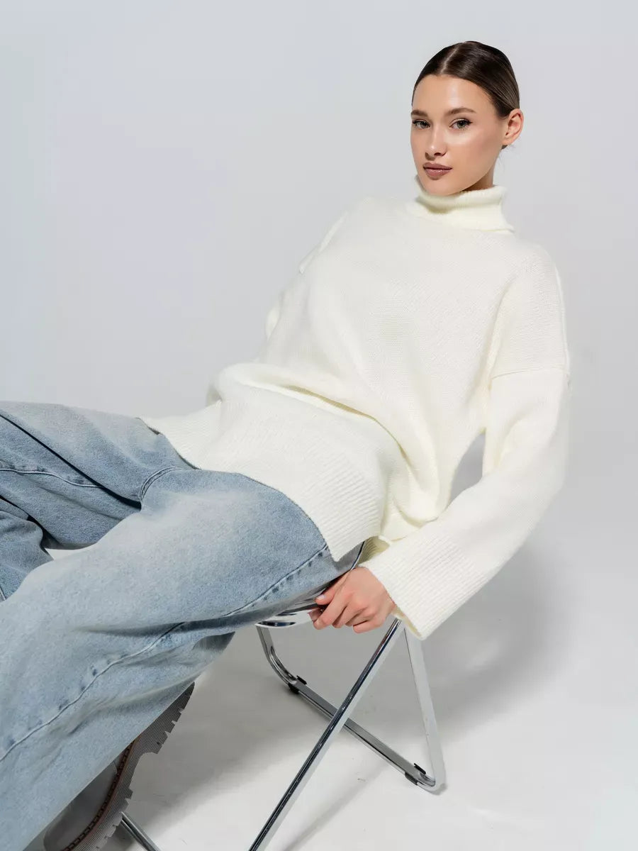 Luna Sweater by Lauven in a soft milk white color, featuring an oversized knit design for women's fall style.